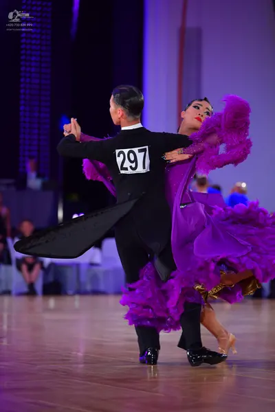 Dancesport competitor #297: Male dancer: black ballroom suit