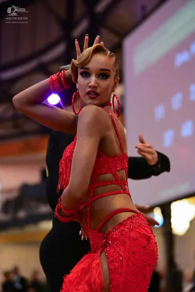 Dancesport competitor: Male dancer: black suit
