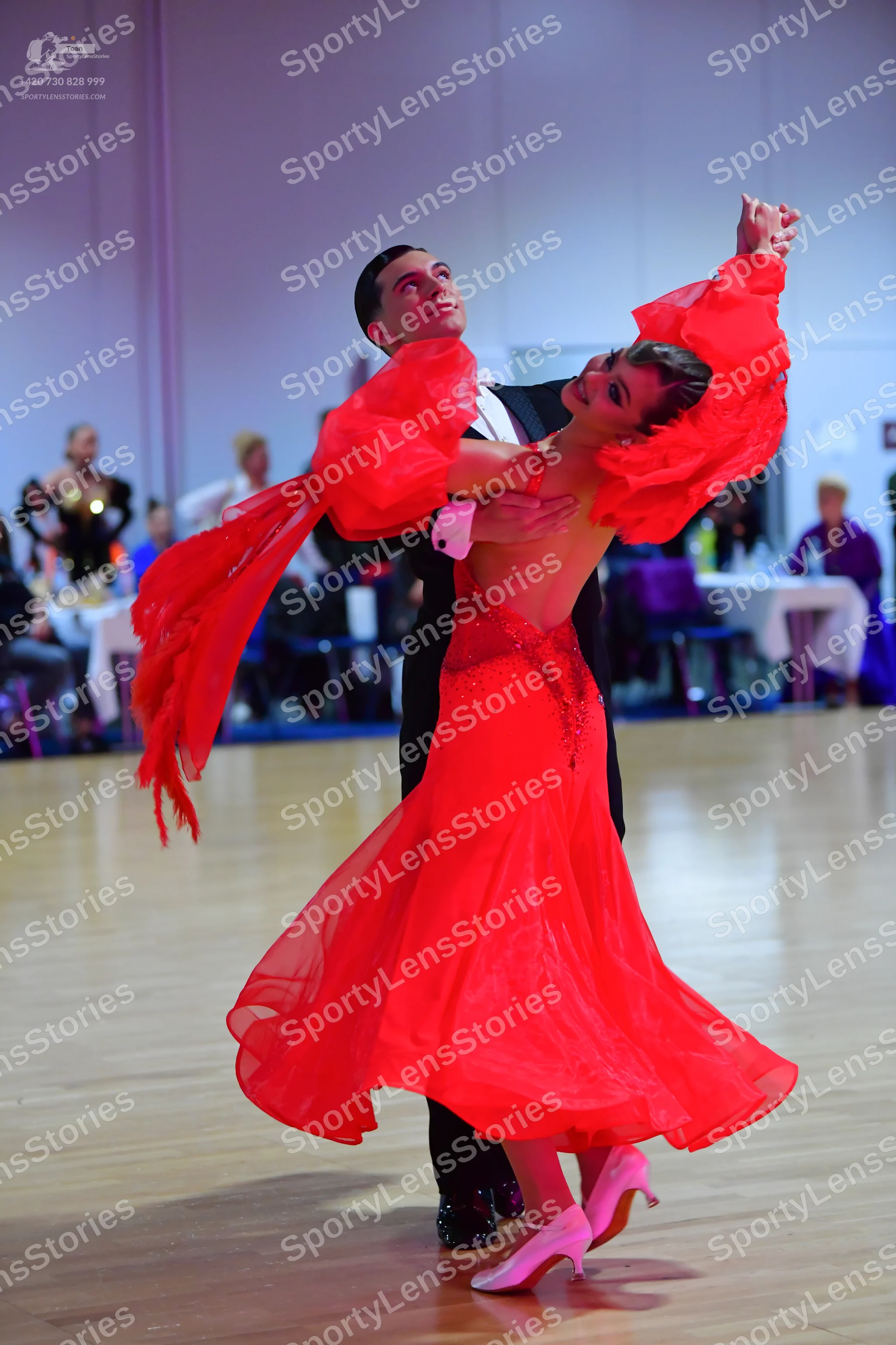 Dancesport competitor: Male dancer: black suit and trousers with a white shirt