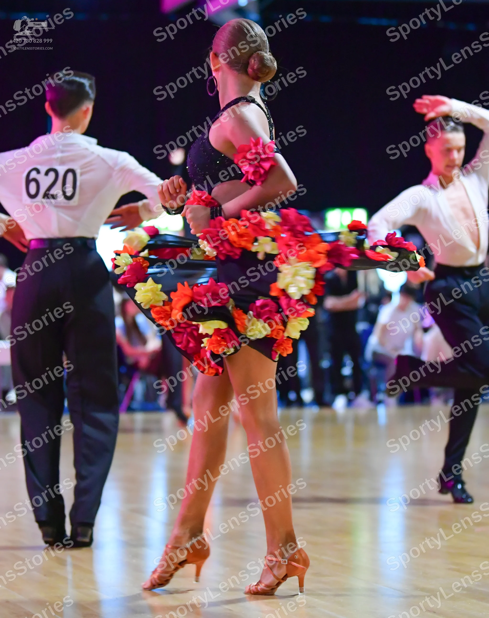 Dancesport competitor #620: Male dancer (left): white long-sleeved shirt and black trousers