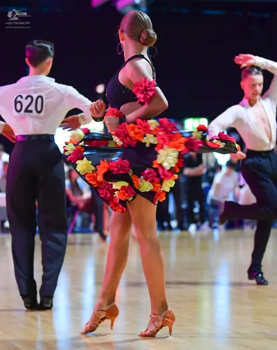 Dancesport competitor #620: Male dancer (left): white long-sleeved shirt and black trousers