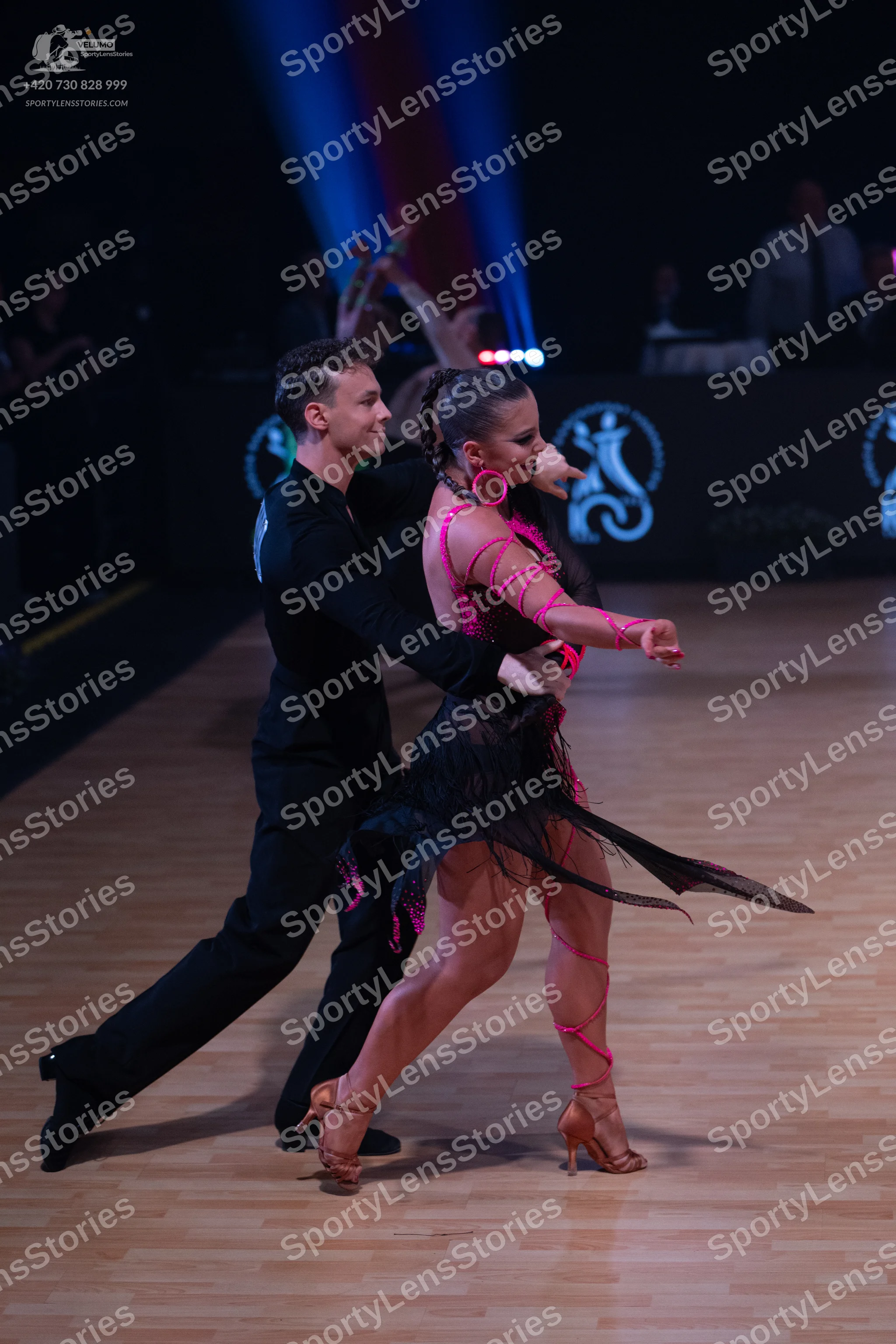 Dancesport competitor: Male dancer: black long-sleeved dance shirt and black trousers