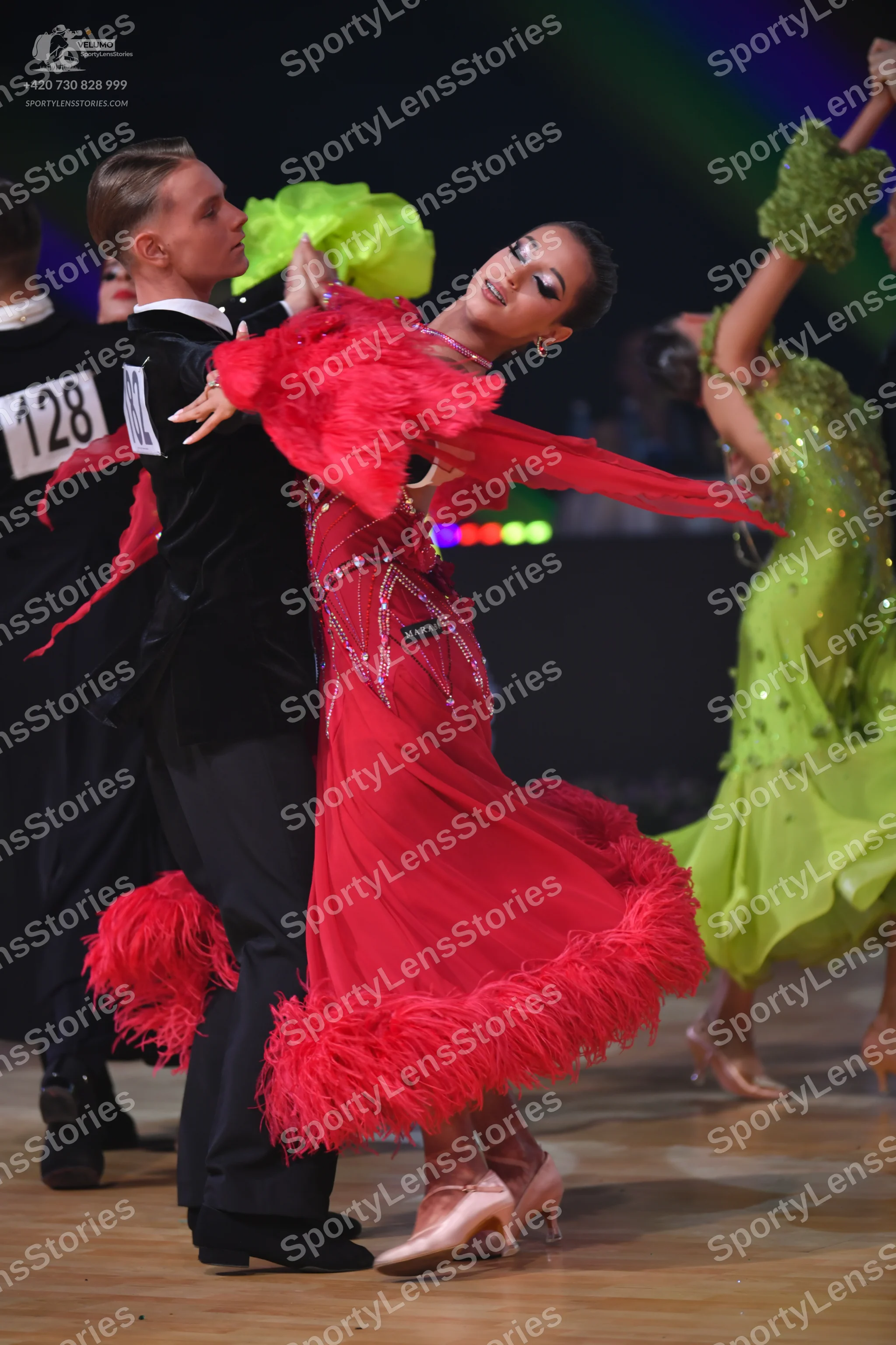 Dancesport competitor: Male dancer: black suit with a white shirt