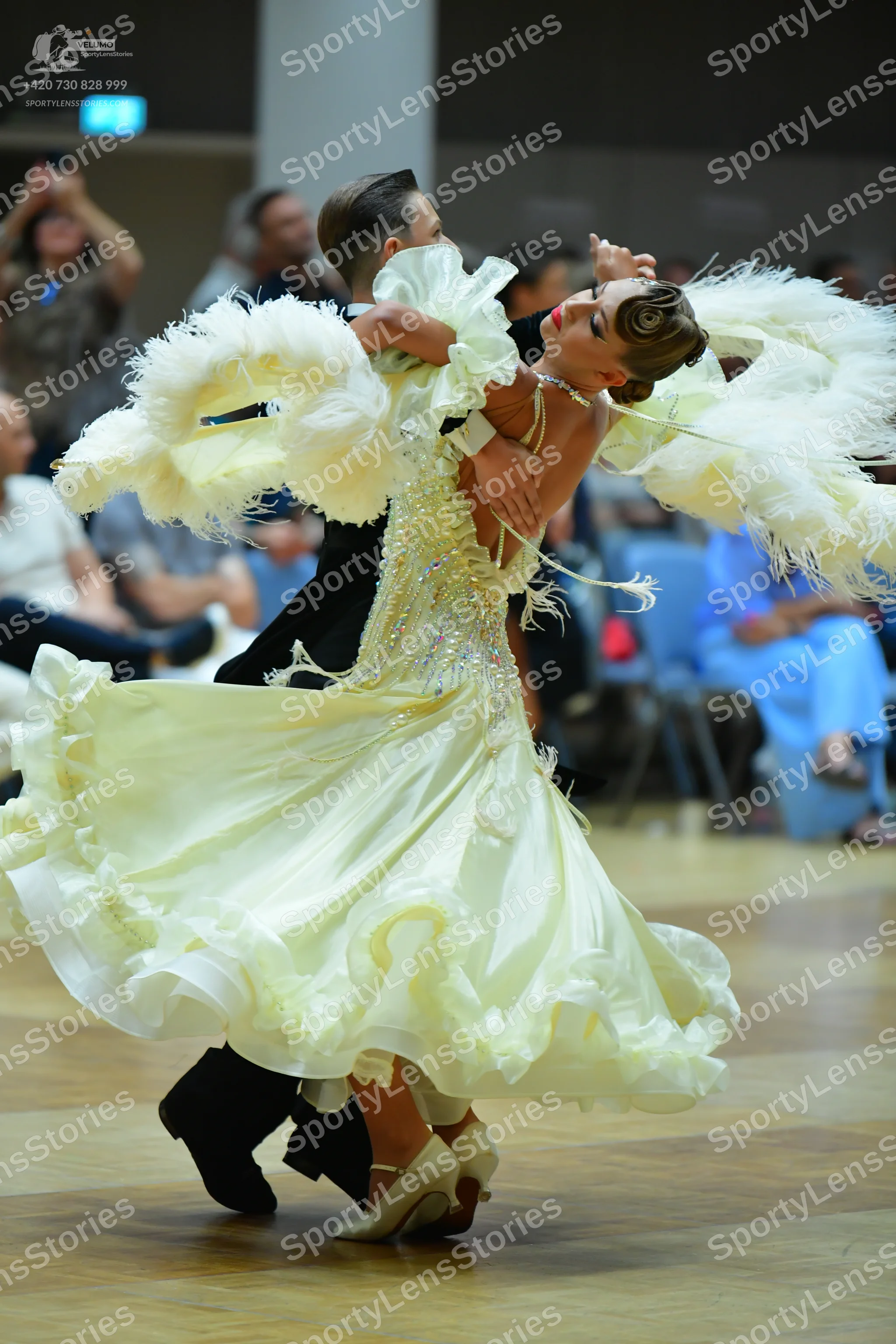 Dancesport competitor: Male dancer: black suit