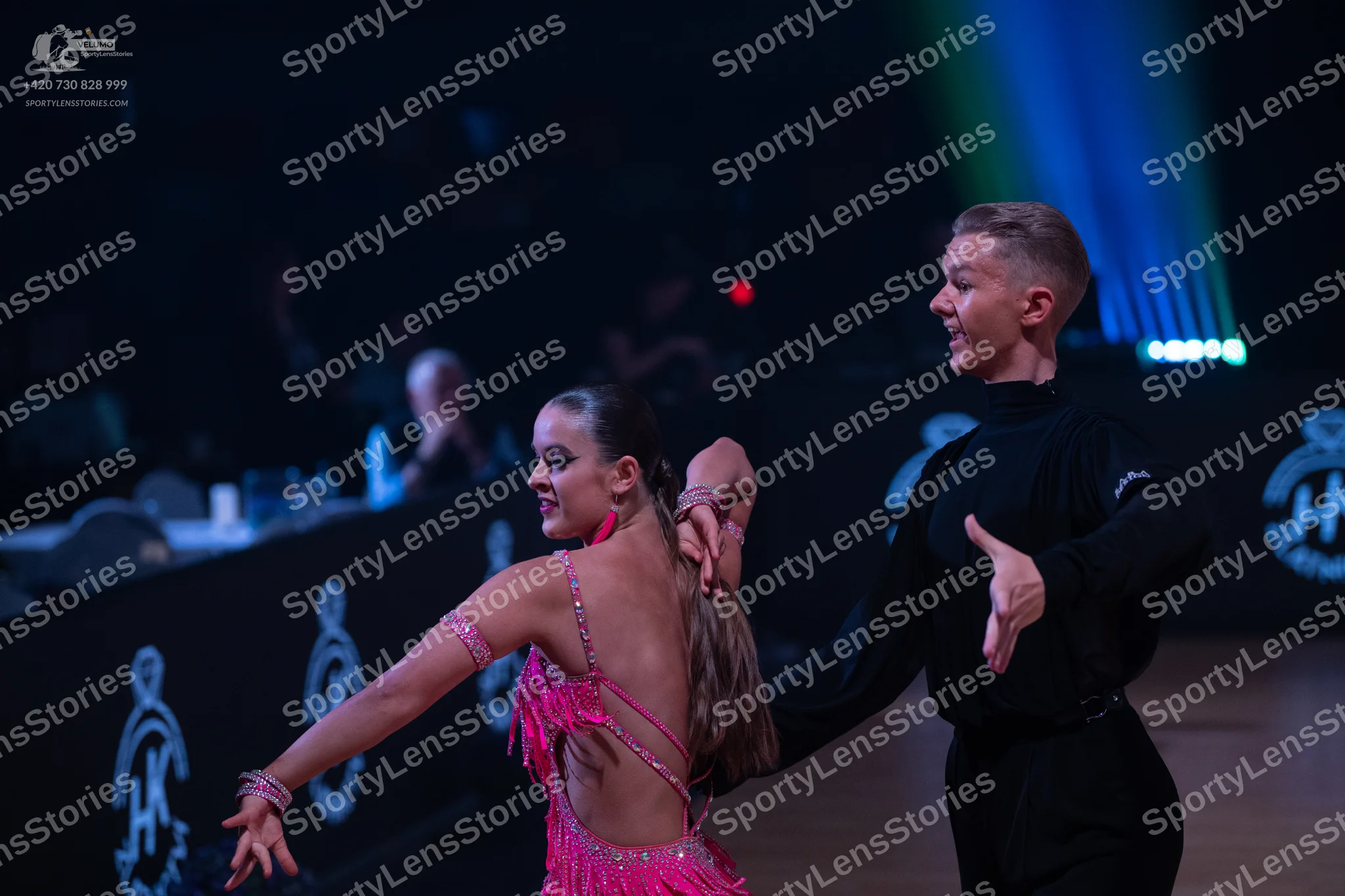 Dancesport competitor: Male dancer: black long-sleeved dance shirt and black trousers