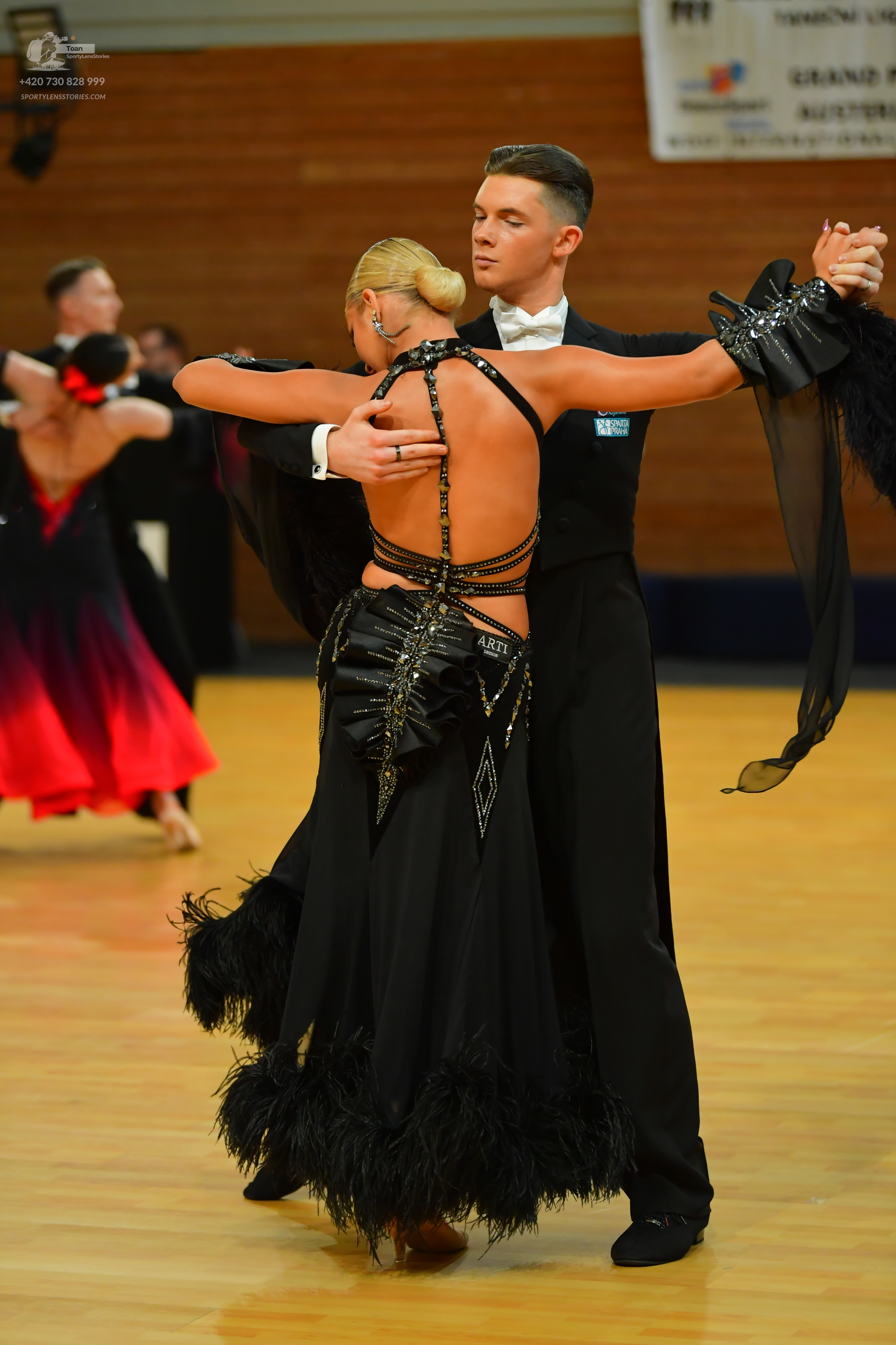 Dancesport competitor: ** Black tail suit