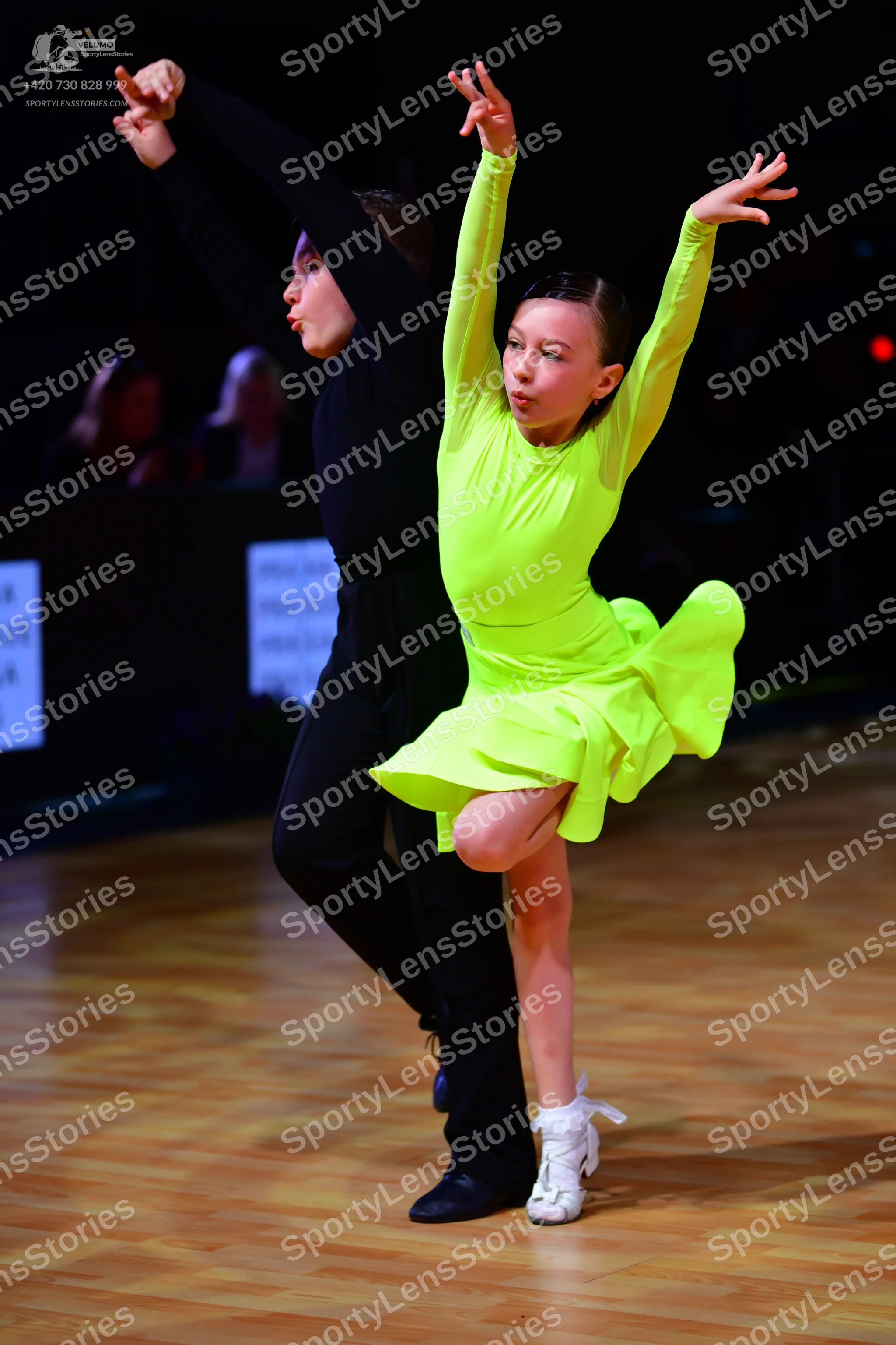 Dancesport competitor: Male dancer: black long-sleeved top and black trousers