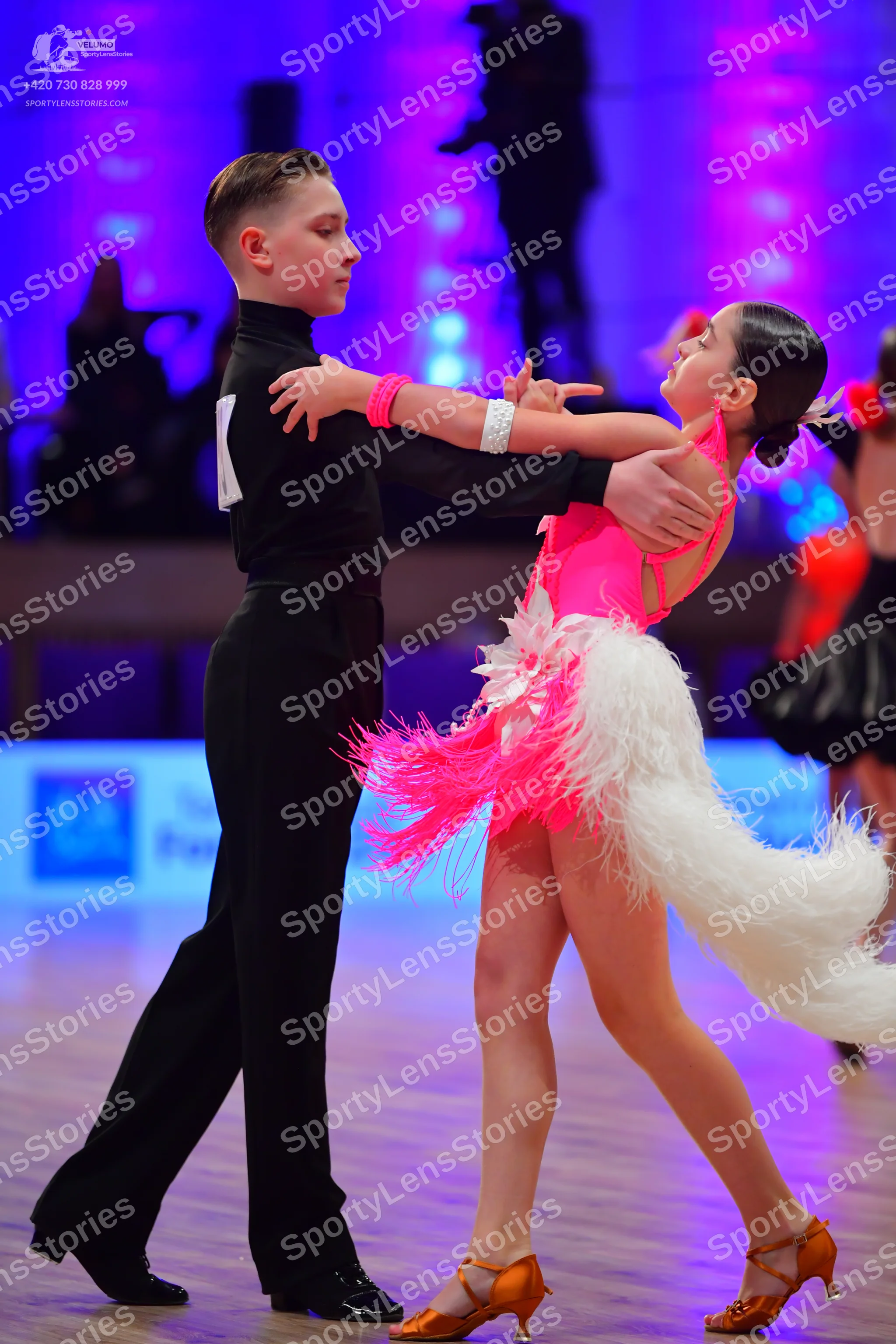 Dancesport competitor: Male dancer: black long-sleeved shirt and black trousers