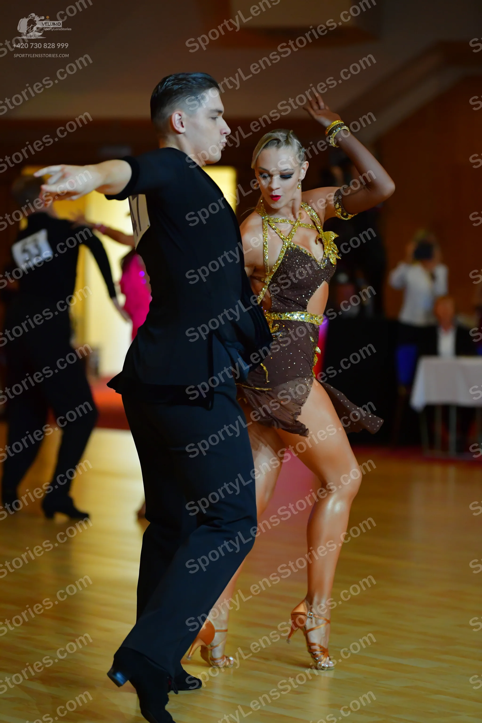 Dancesport competitor #53: Male dancer: black long-sleeved dance top and black trousers