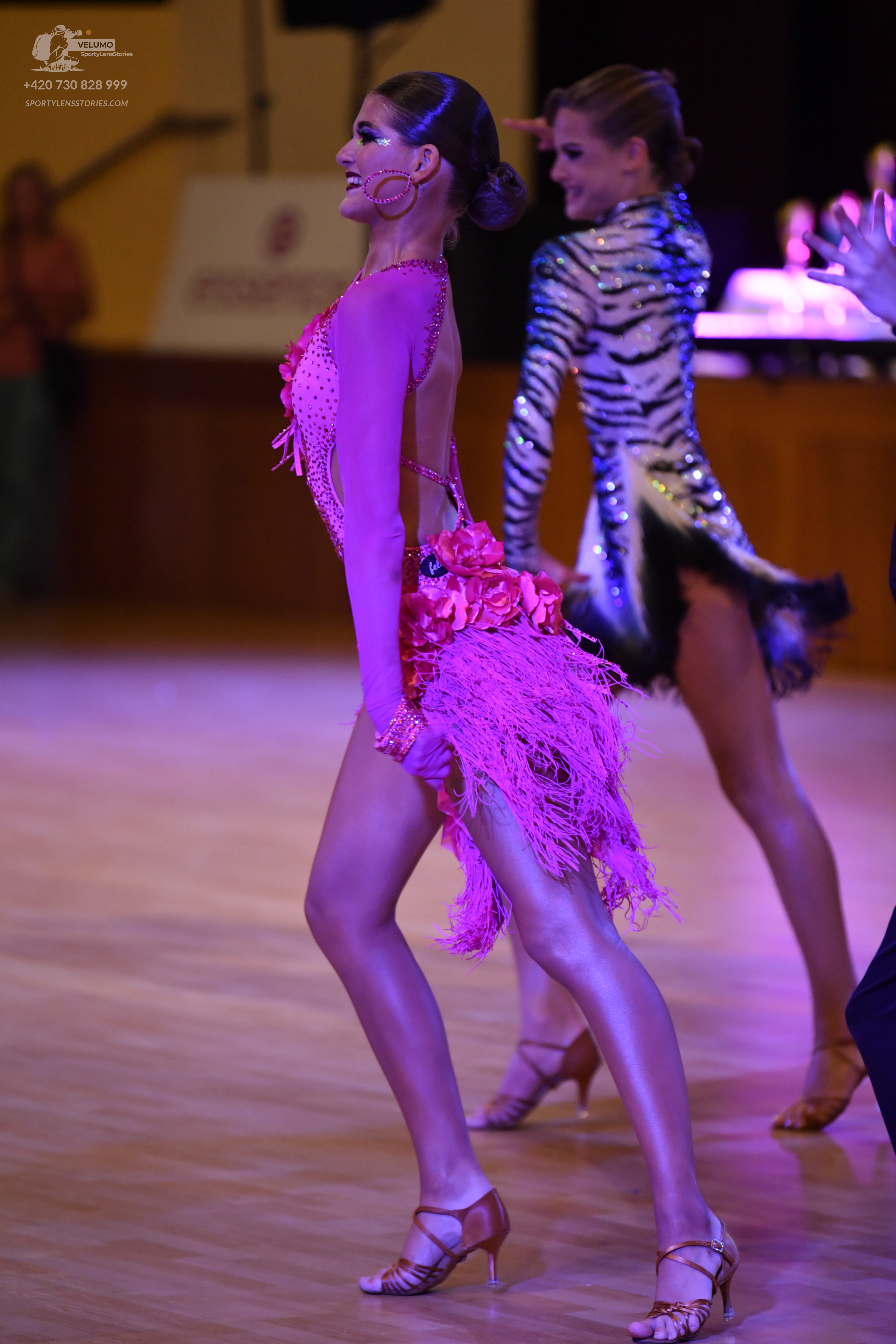 Dancesport competitor: ** Pink Latin dress