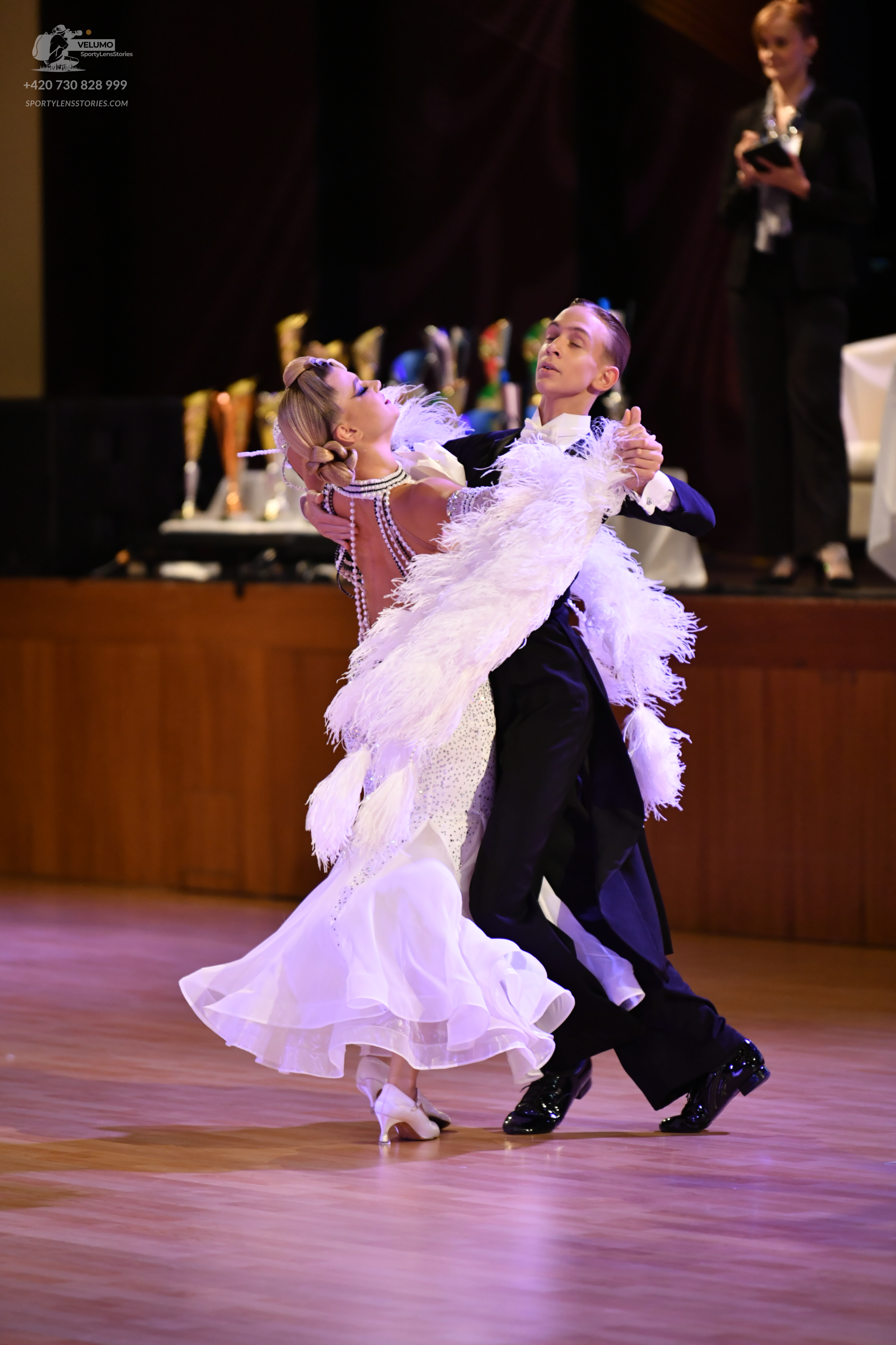 Dancesport competitor: ** White ballgown