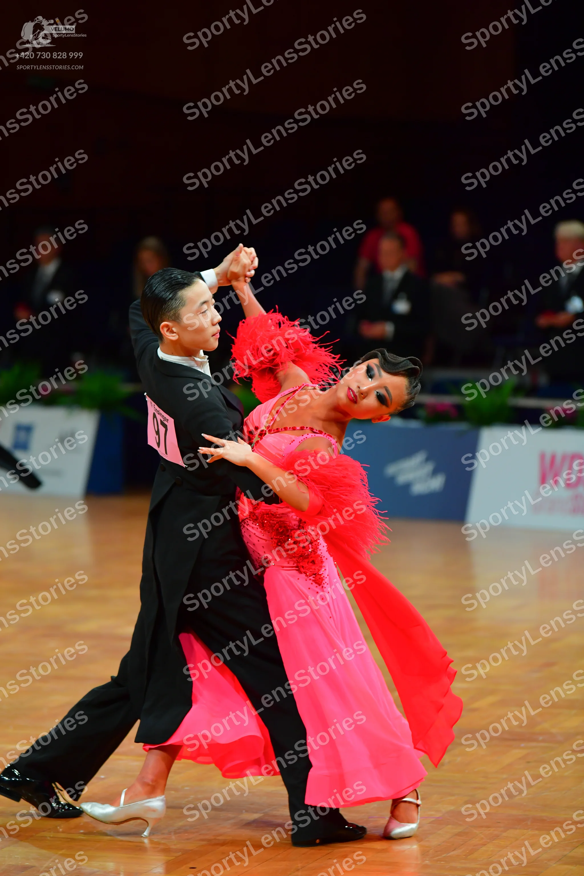 Dancesport competitor: Male dancer: black tailcoat suit with black trousers and black shoes