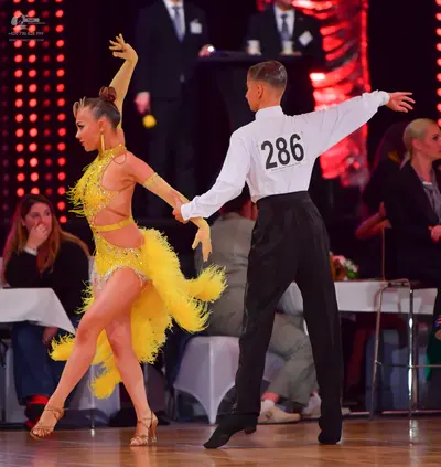 Dancesport competitor #286: Male dancer: white long-sleeved shirt and black trousers