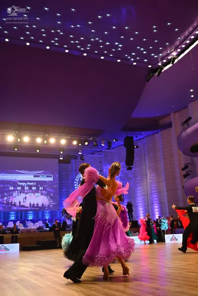 Dancesport competitor: Male dancer: black suit