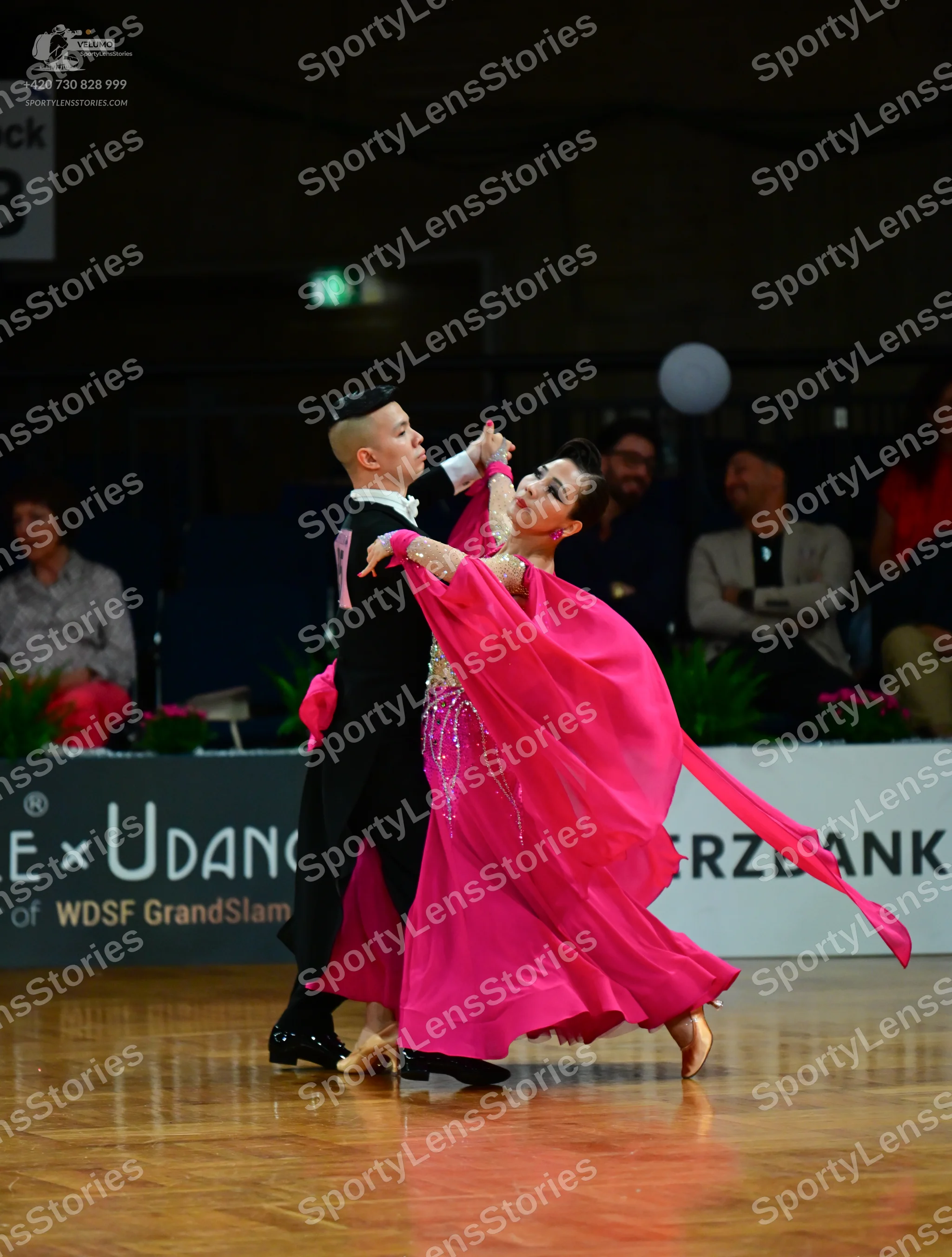 Dancesport competitor: Male dancer: black long-sleeved top and black trousers