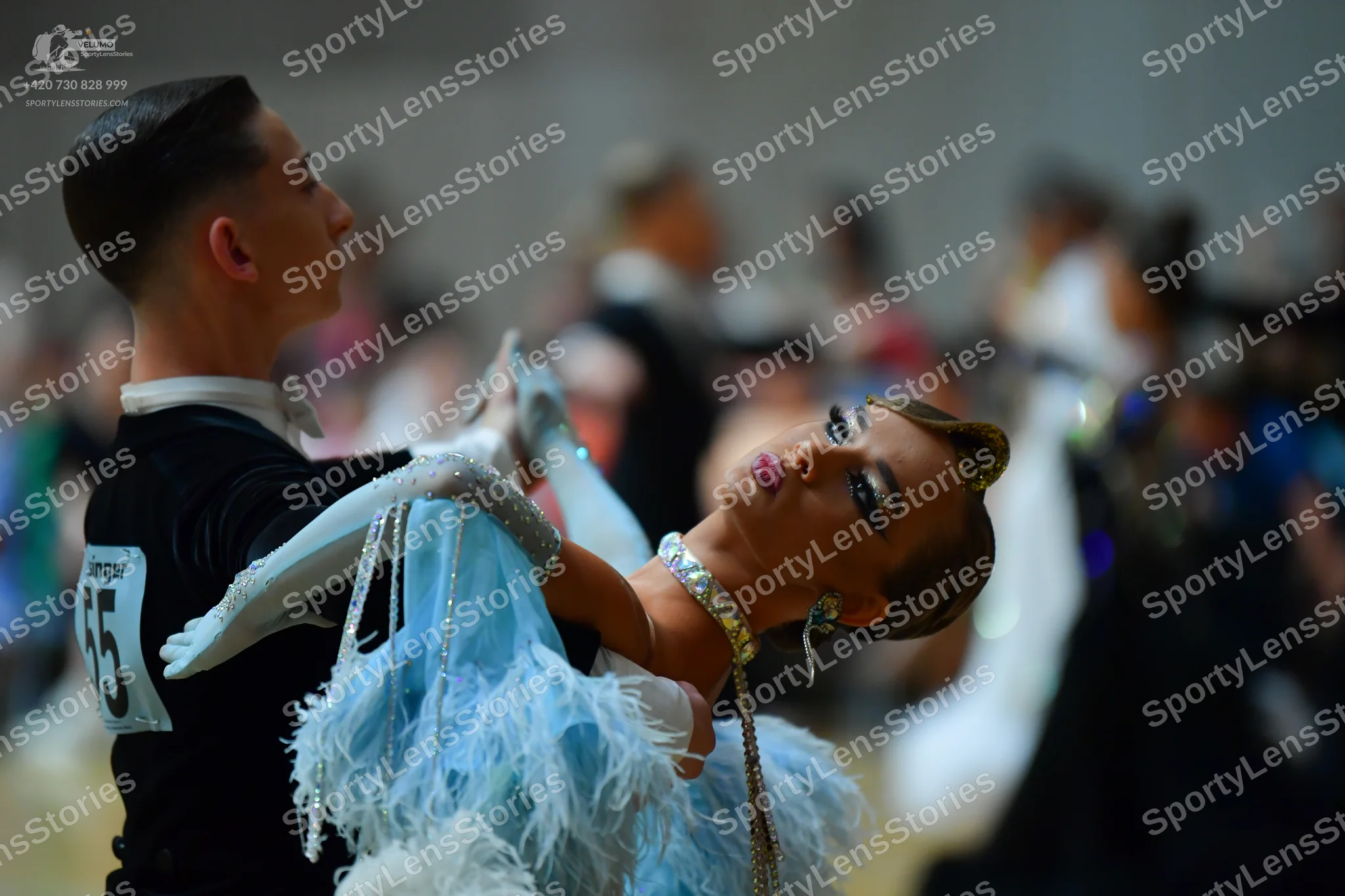Dancesport competitor #55: Male dancer: black long-sleeved dance top with a white collar