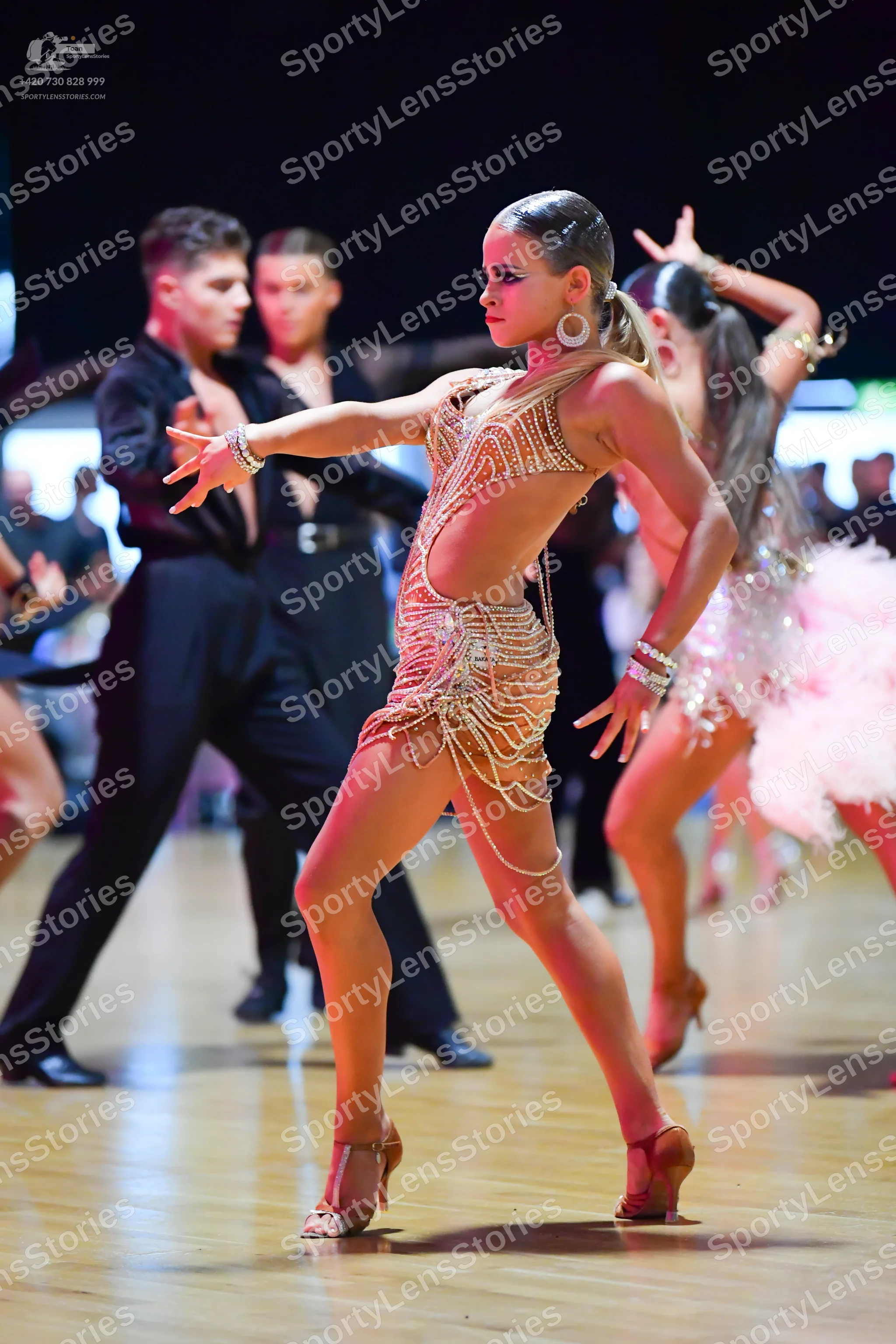 Dancesport competitor: Male dancers: black long-sleeved shirts and black trousers