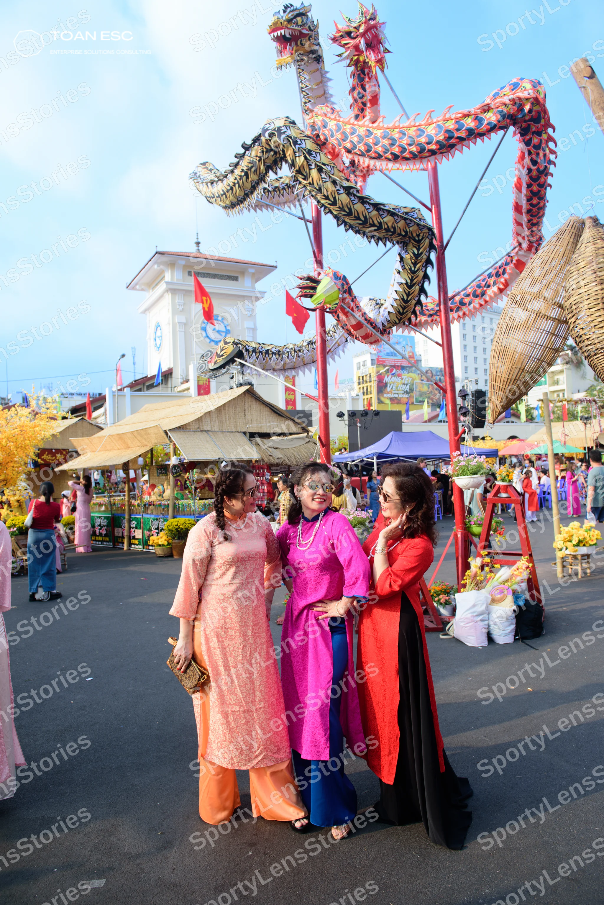 Dancesport competitor: Three female dancers are wearing traditional Vietnamese Áo dài