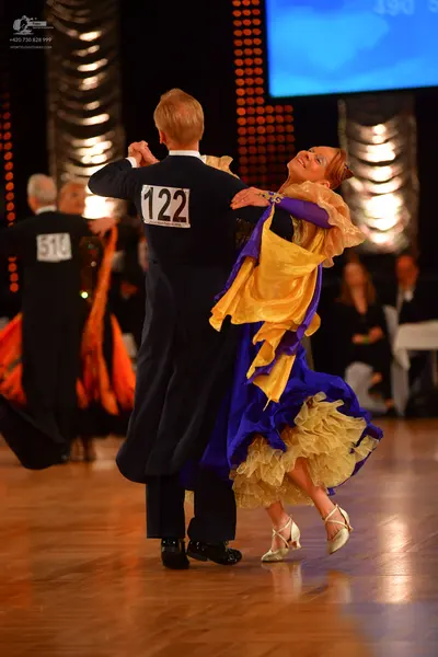 Dancesport competitor #510, #122: Male dancers: black and dark navy ballroom suits
