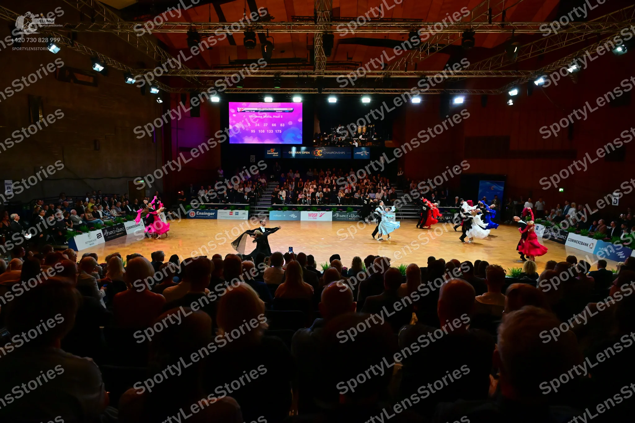Dancesport competitor: Female dancer (far left): pink ballgown with a voluminous skirt