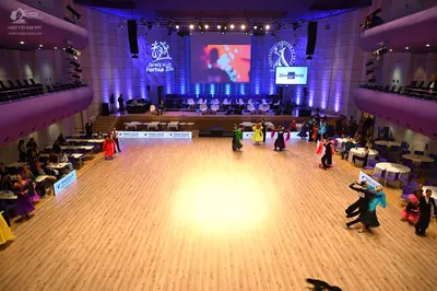 Dancesport competitor: Male dancer: black suit