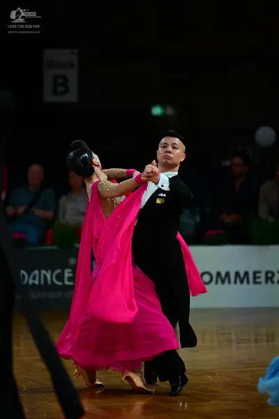 Dancesport competitor: Male dancer: black ballroom suit