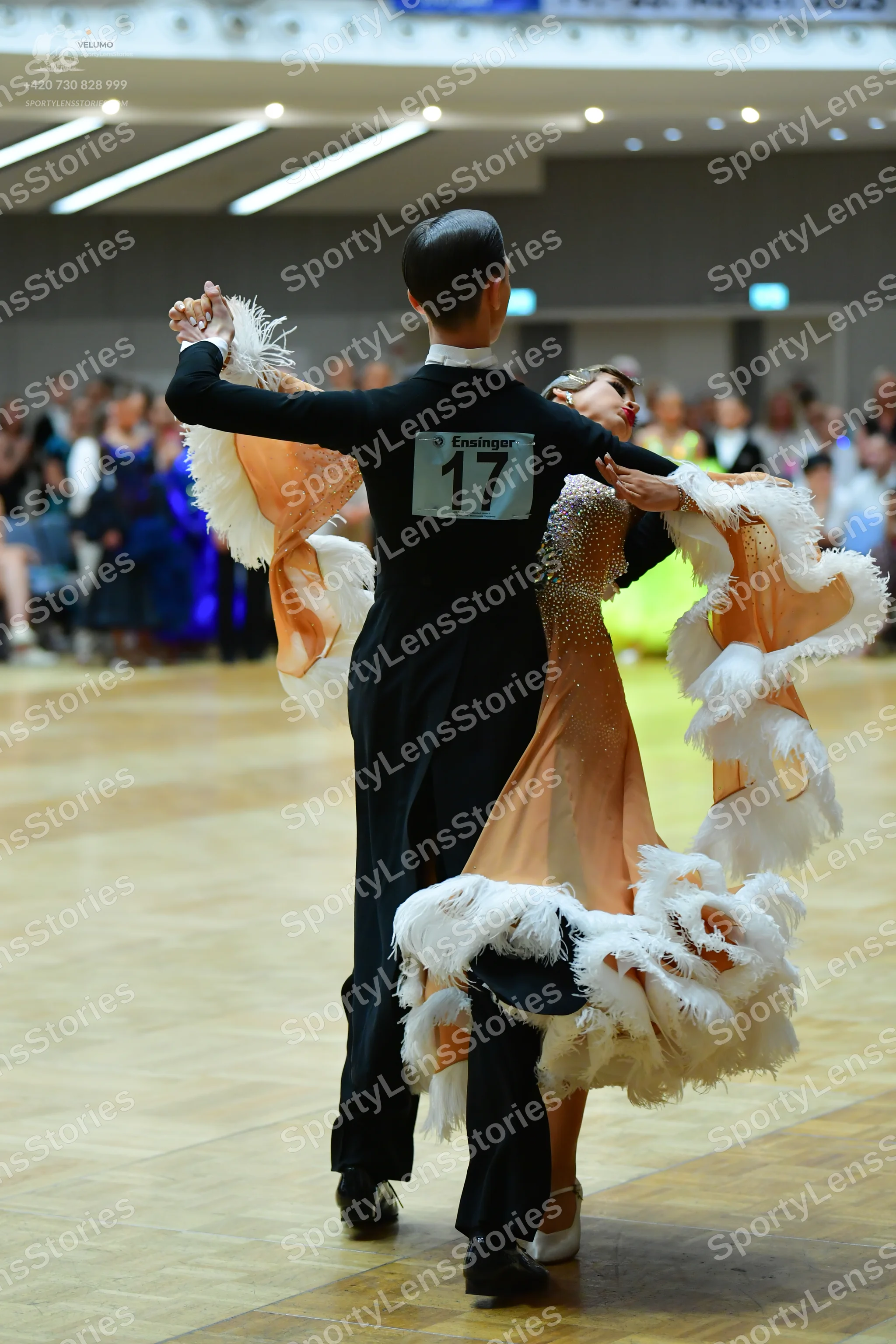 Dancesport competitor #17: Male dancer: black long-sleeved shirt and black trousers