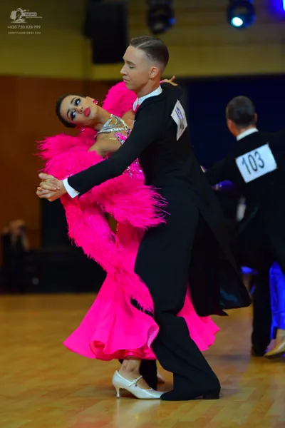 Dancesport competitor #103: Male dancer: black tailcoat suit with a white shirt