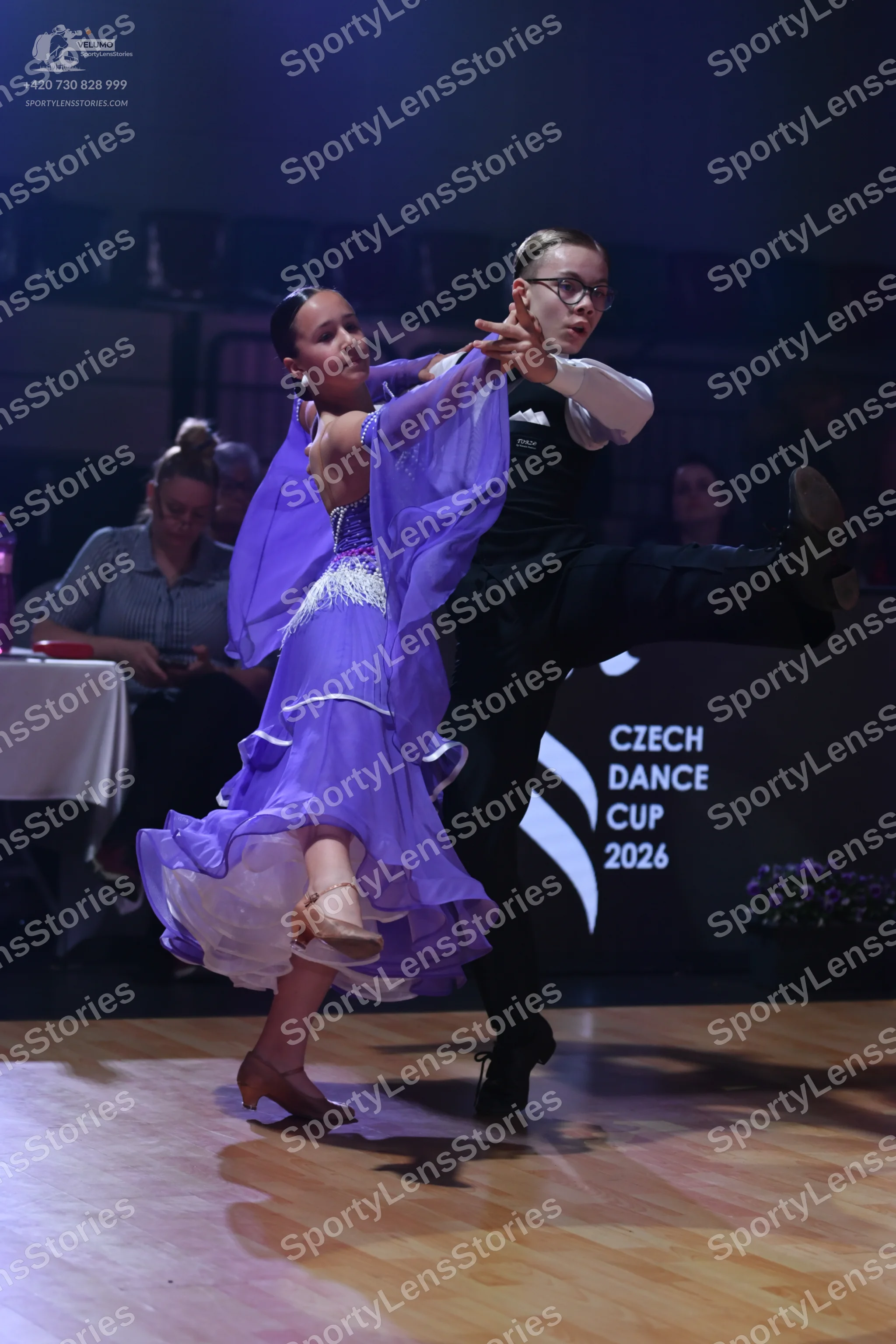 Dancesport competitor: Male dancer: black long-sleeved shirt and black trousers