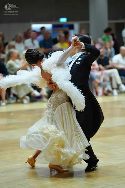 Dancesport competitor #85: Male dancer: black ballroom suit