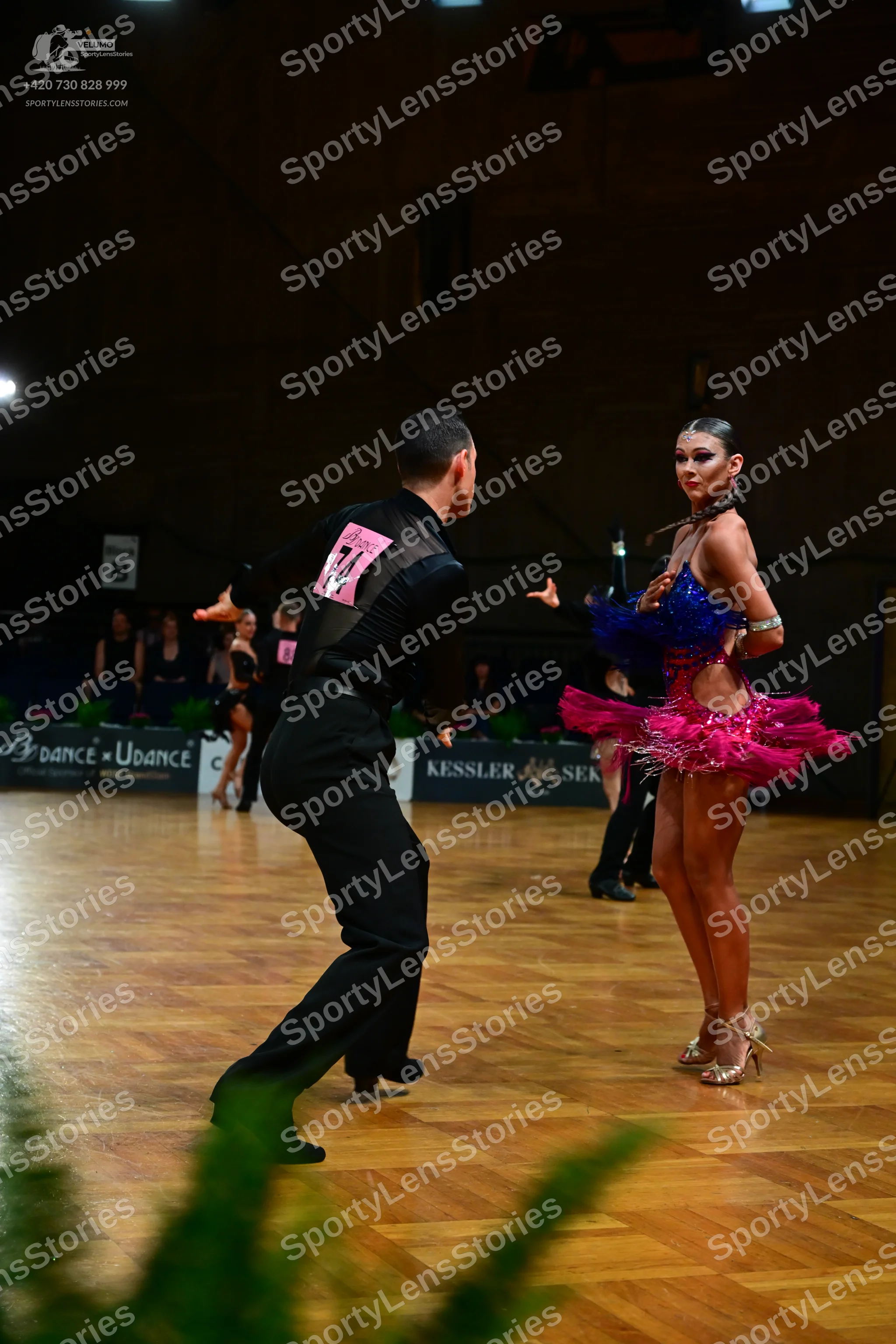 Dancesport competitor #16: Male dancer: black long-sleeved dance shirt and black trousers