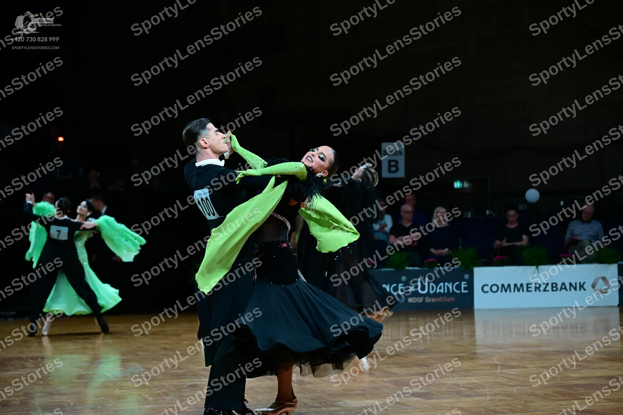 Dancesport competitor #10: Male dancer (left): black shirt and trousers