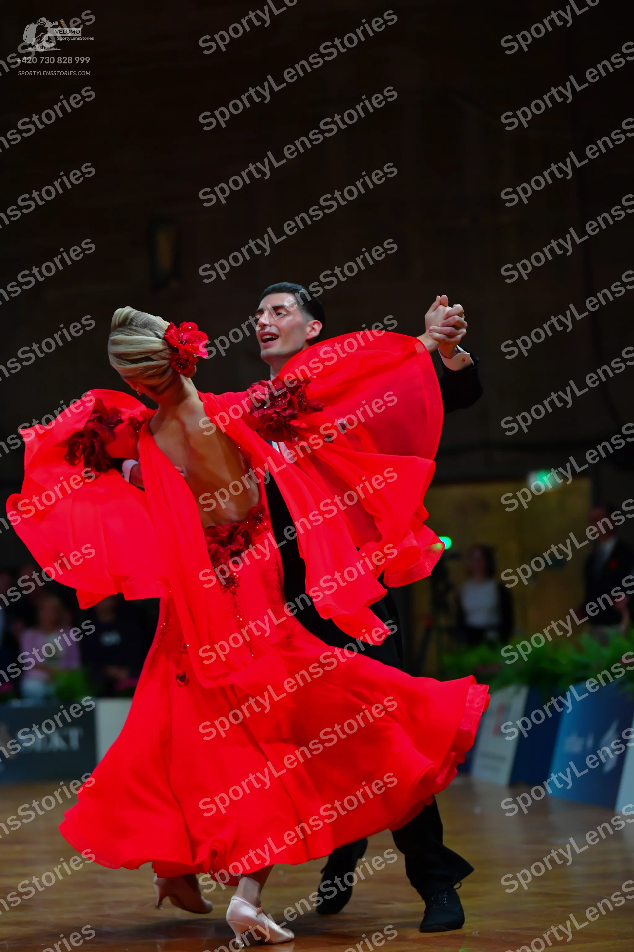 Dancesport competitor: Male dancer: black suit with a black shirt
