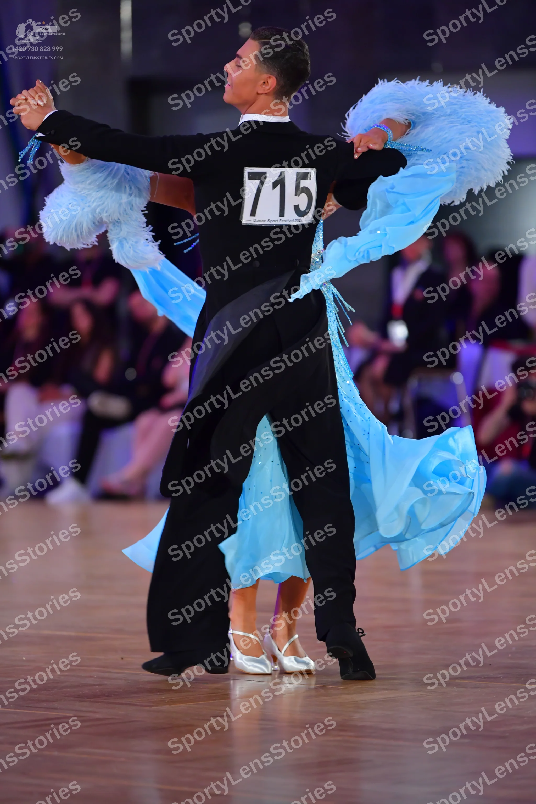 Dancesport competitor #715: Male dancer: black suit