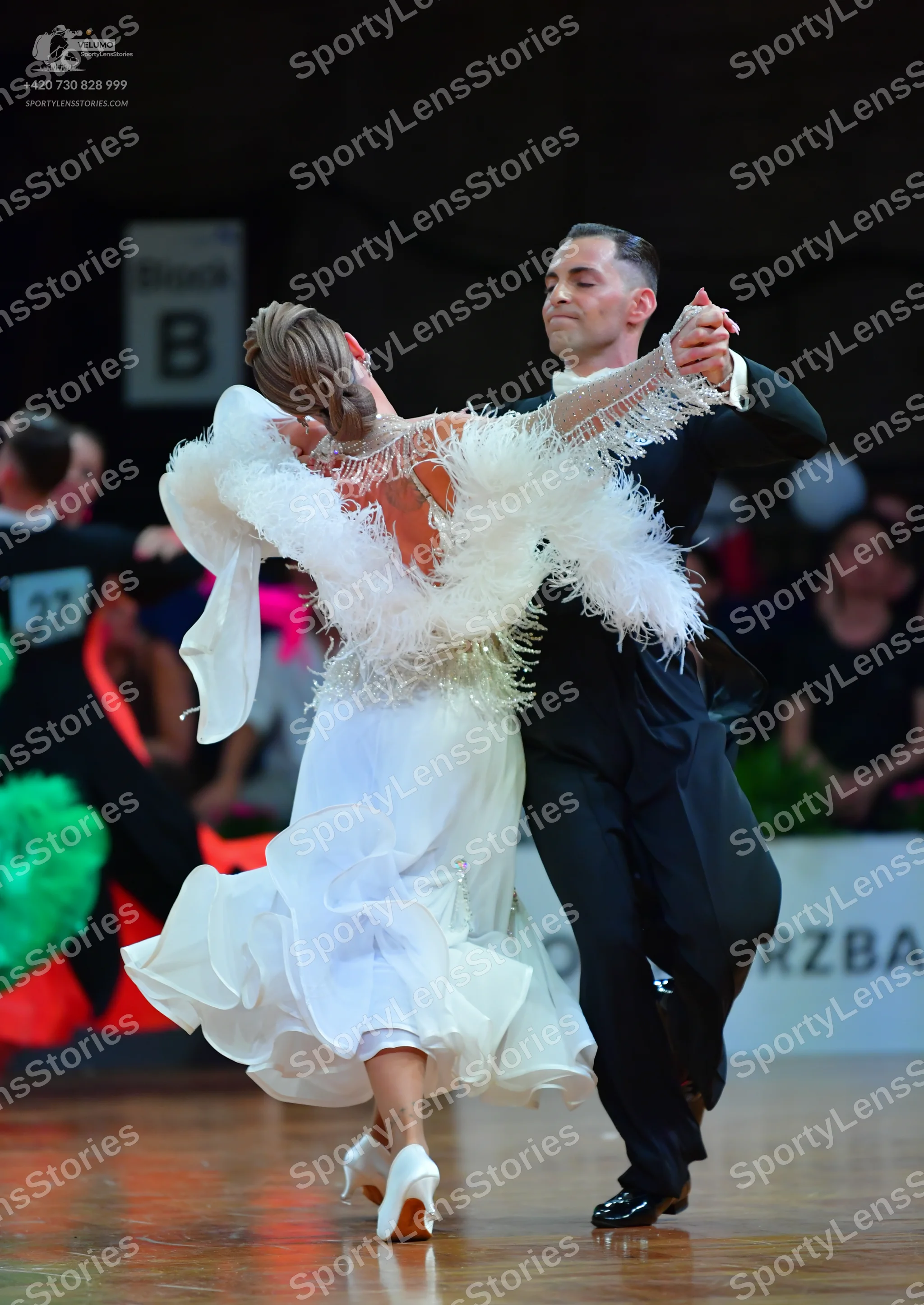 Dancesport competitor #27: Male dancer: black suit and black dance shoes