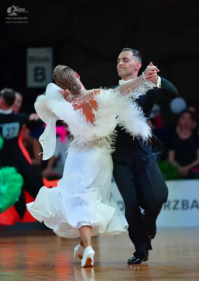Dancesport competitor #27: Male dancer: black suit and black dance shoes