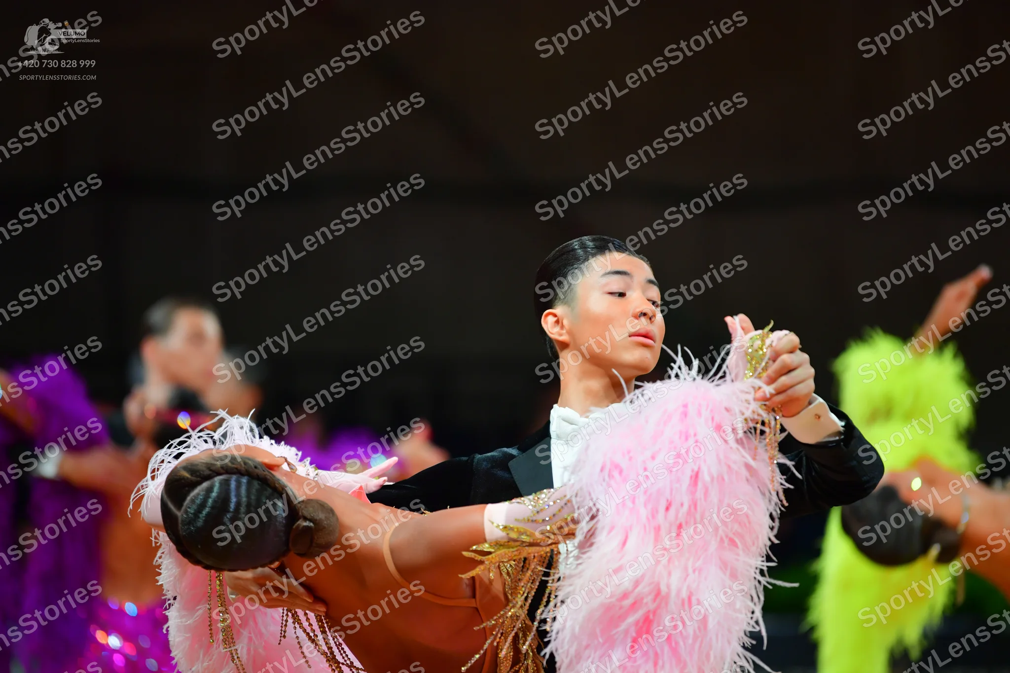 Dancesport competitor: Male dancer: black suit