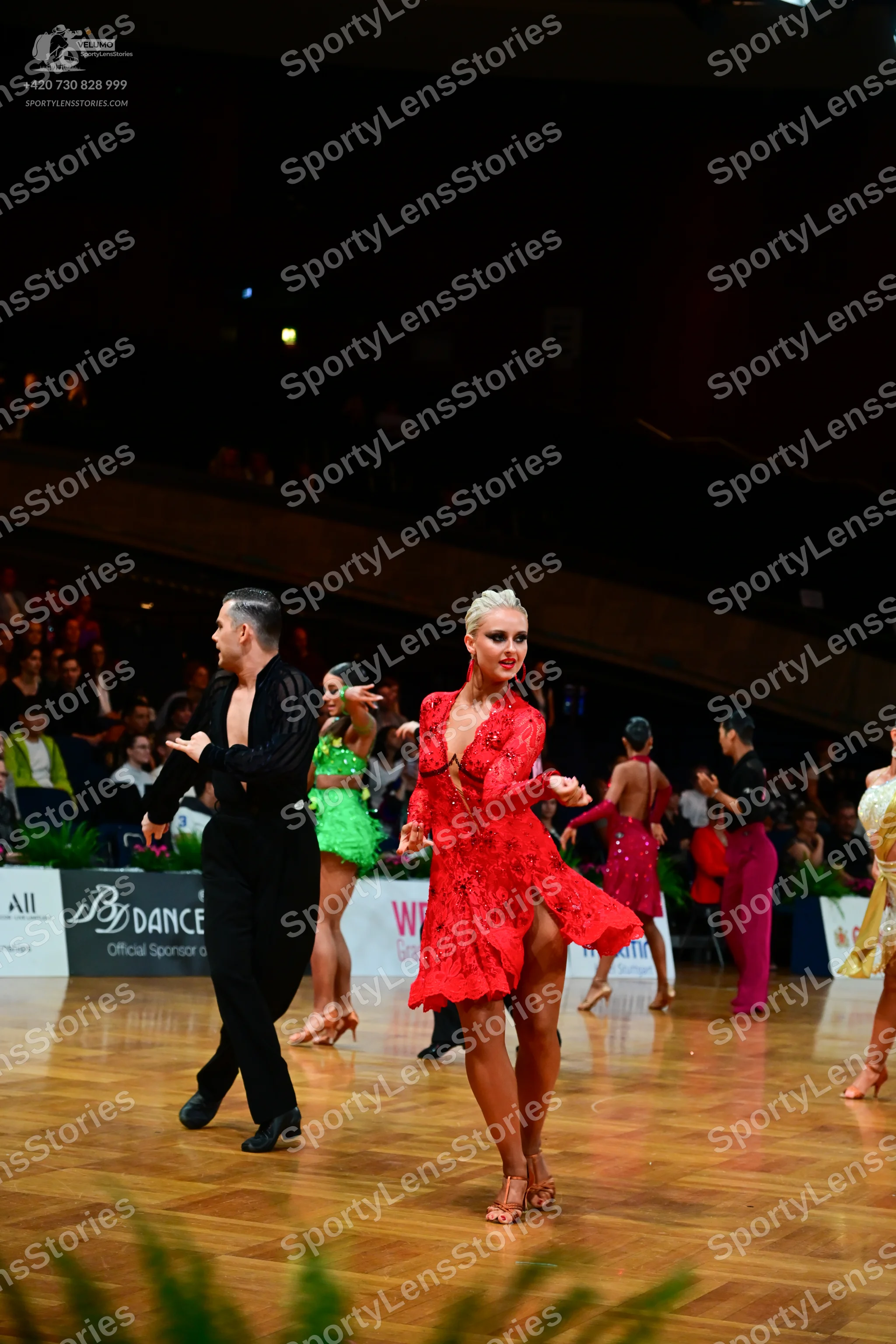 Dancesport competitor: Male dancer: black long-sleeved shirt and black trousers