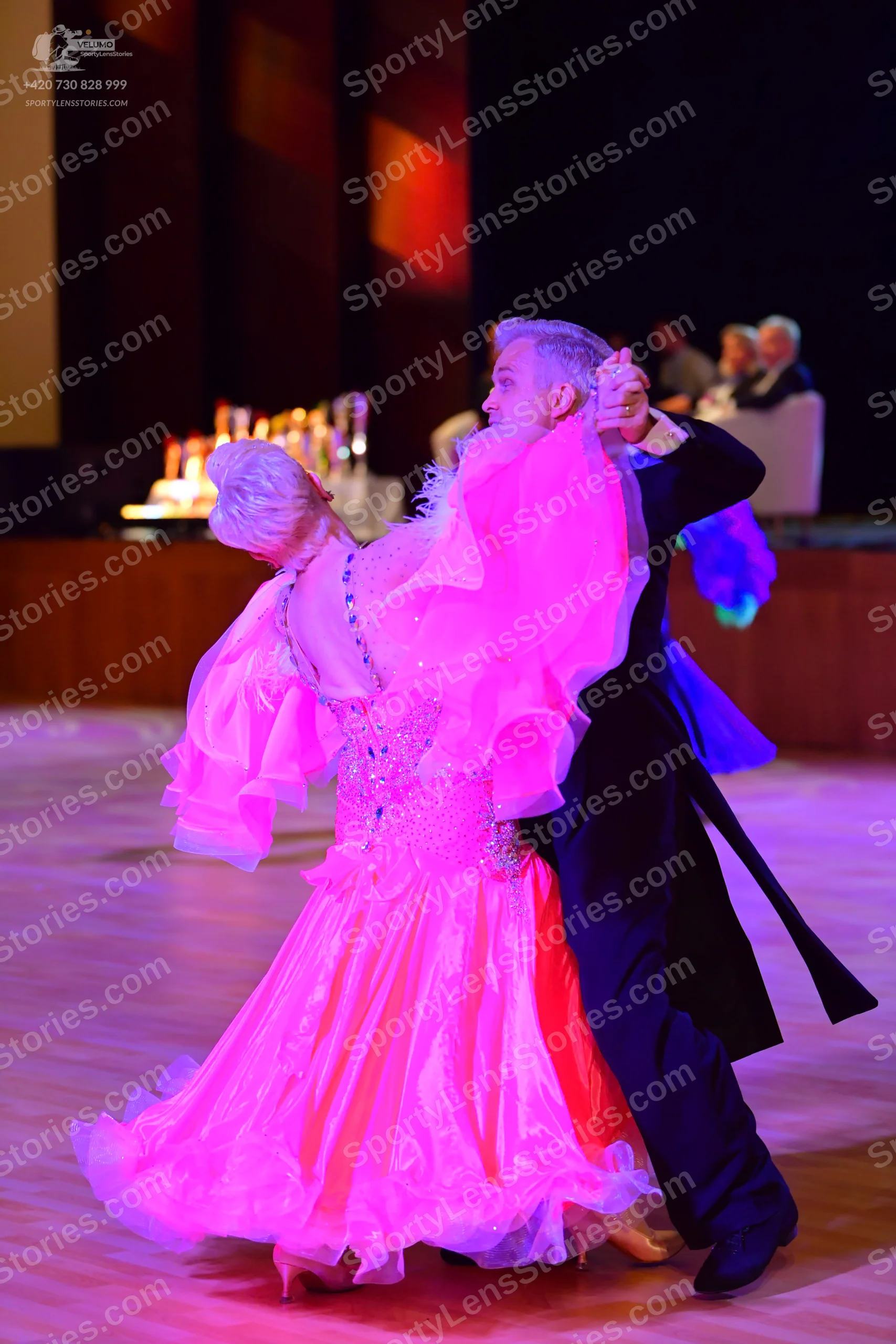 Dancesport competitor: ** Black tail suit with a wide, dramatic black tail