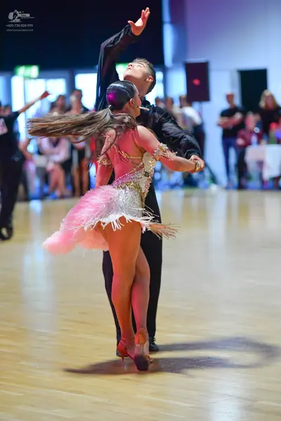 Dancesport competitor: Male dancer: black long-sleeved dance shirt