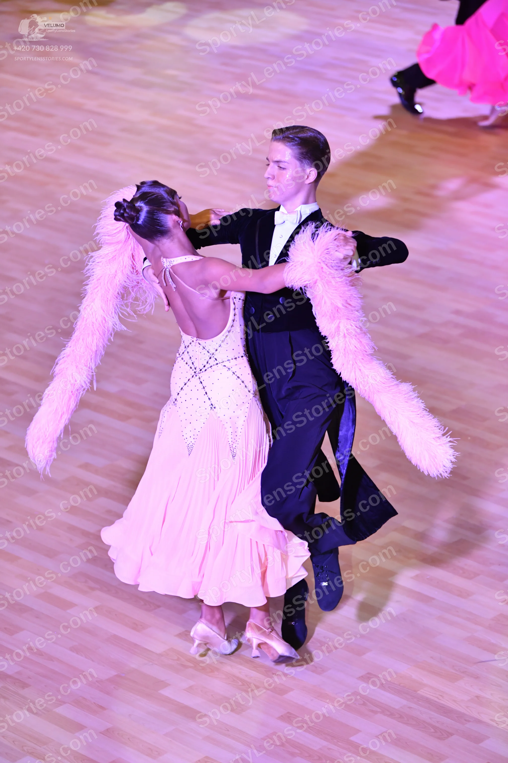 Dancesport competitor: ** Black tail suit