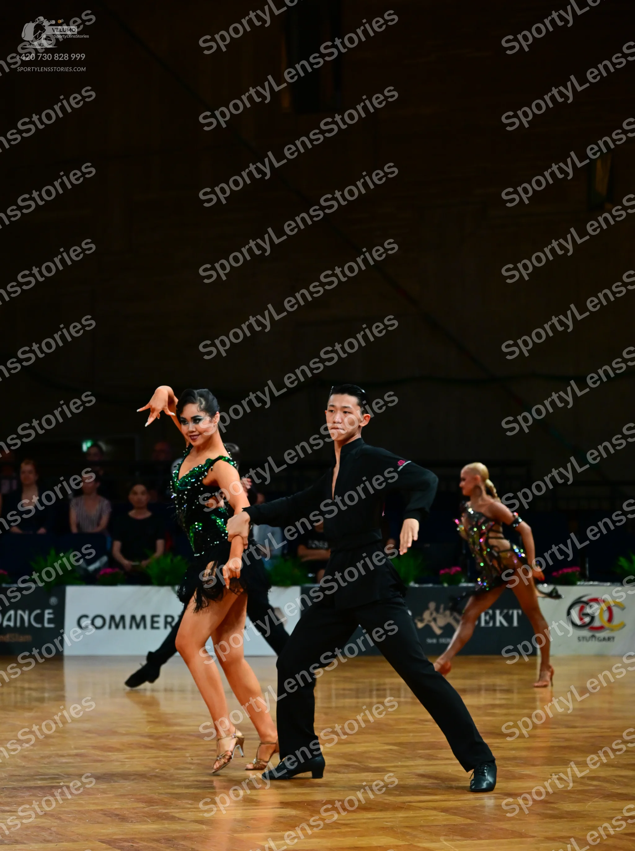 Dancesport competitor: Male dancer: black long-sleeved dance shirt and black trousers
