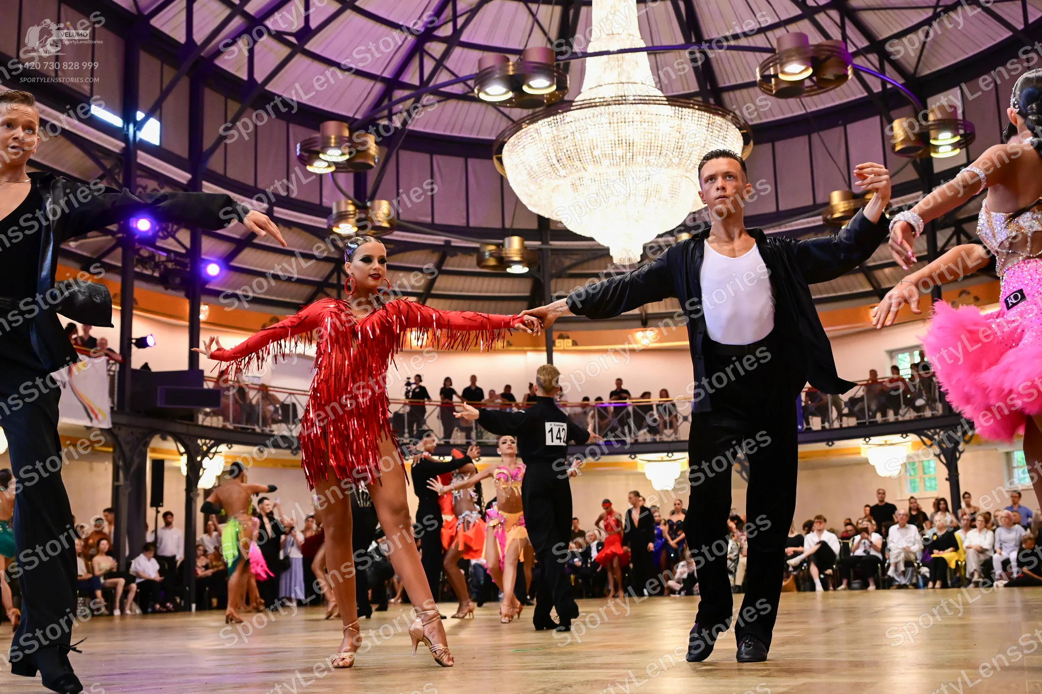 Dancesport competitor #14: Male dancer on left: black suit