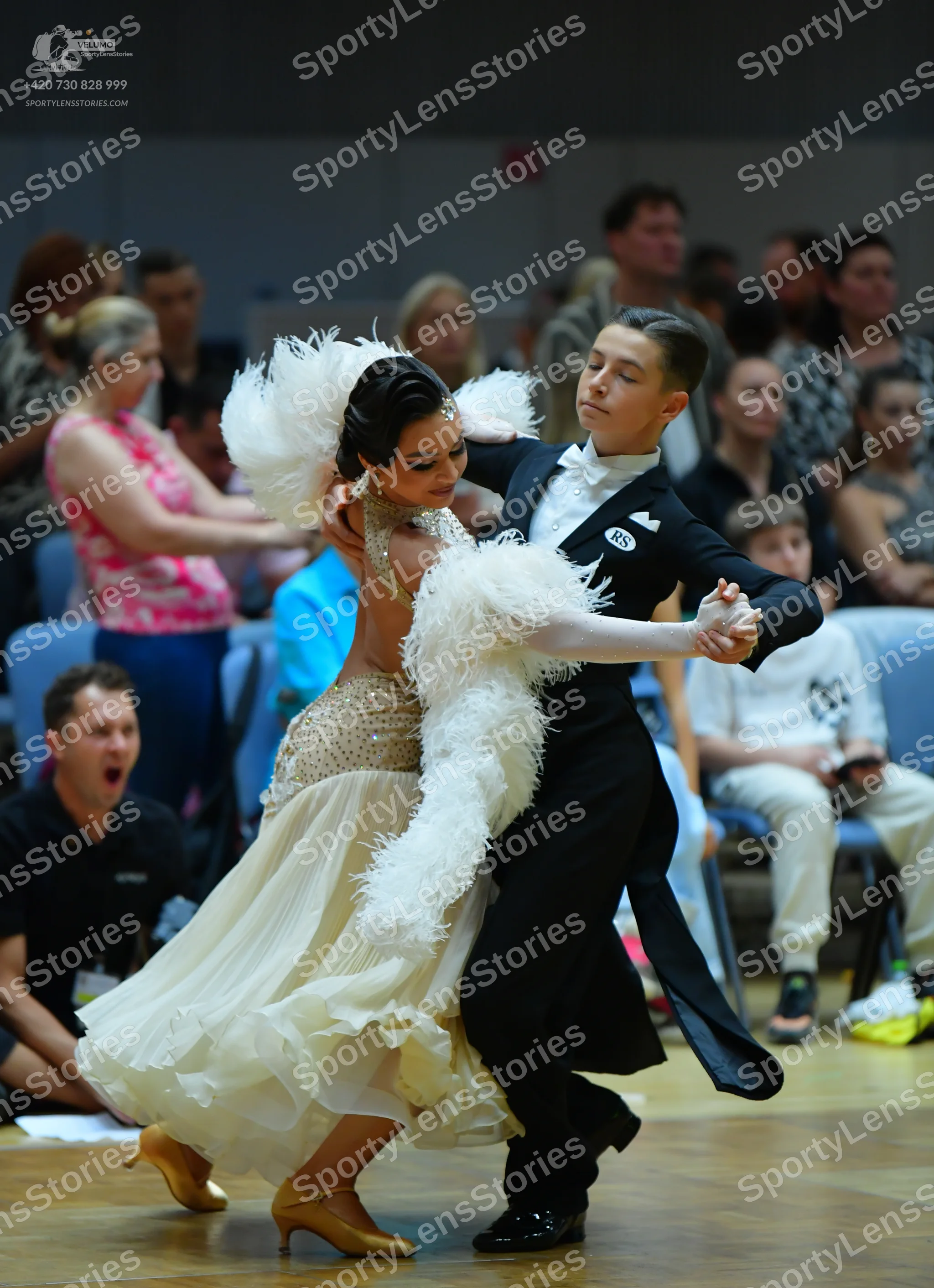 Dancesport competitor #185: Male dancer: black suit with a white shirt and bow tie