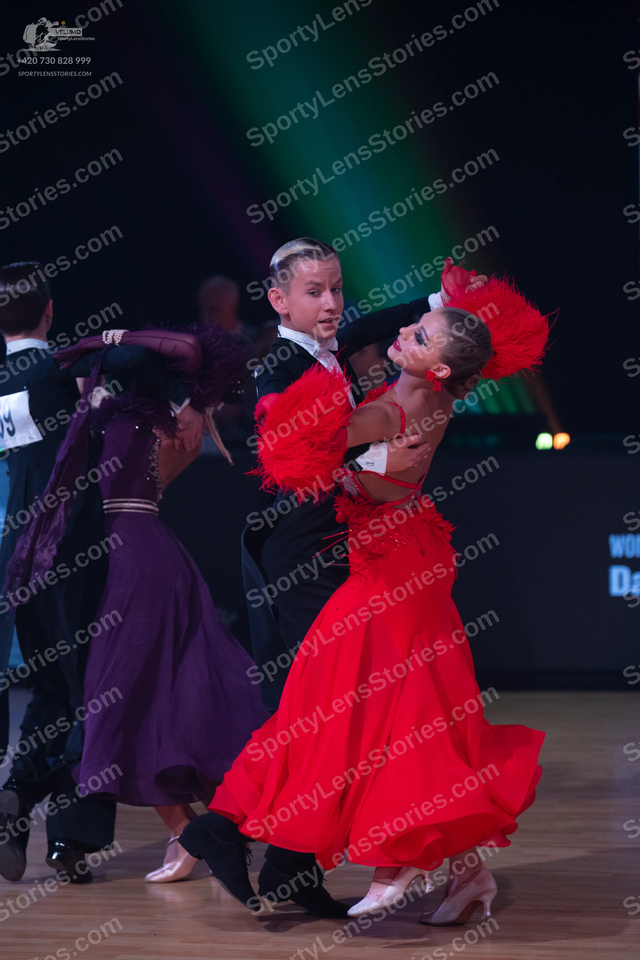 Dancesport competitor: Male dancer 1: black suit with white shirt