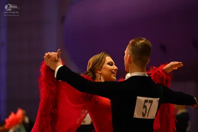Dancesport competitor: Male dancer: black suit