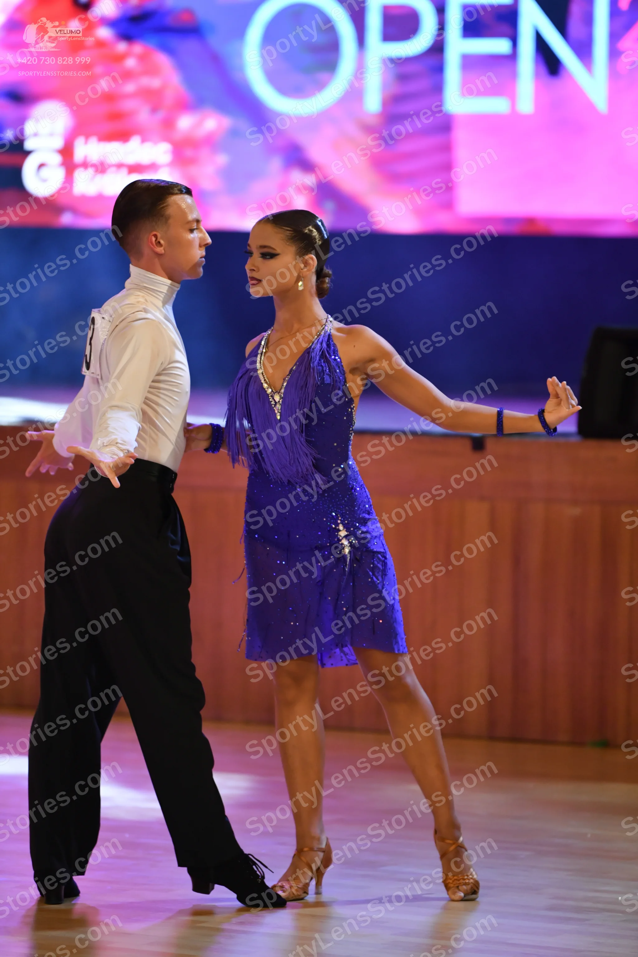 Dancesport competitor: ** Black suit