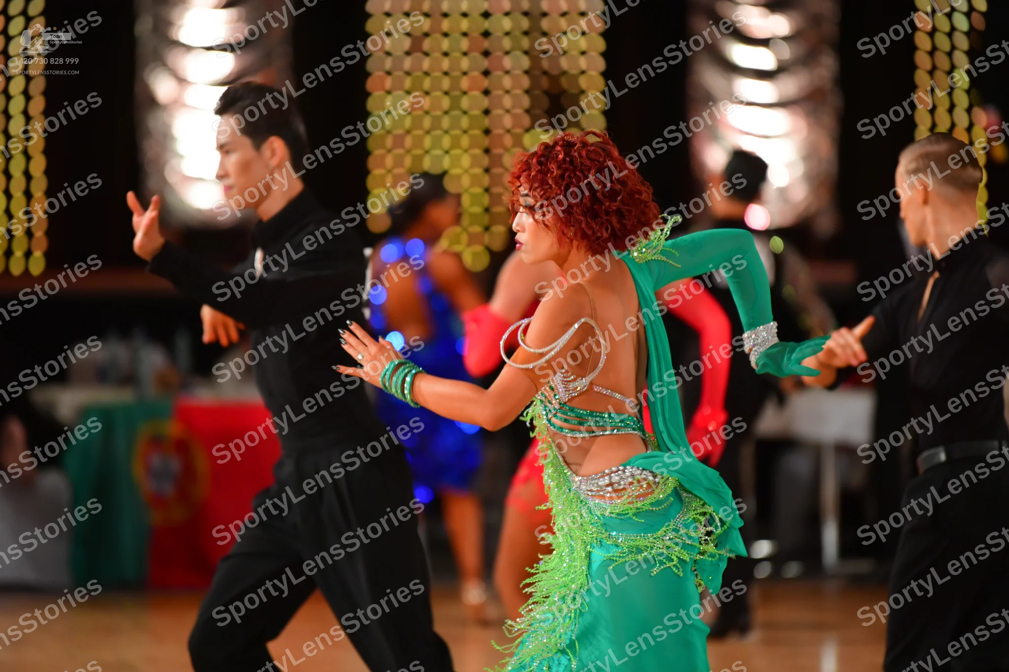 Dancesport competitor: Male dancer (left): black long-sleeved shirt and black trousers