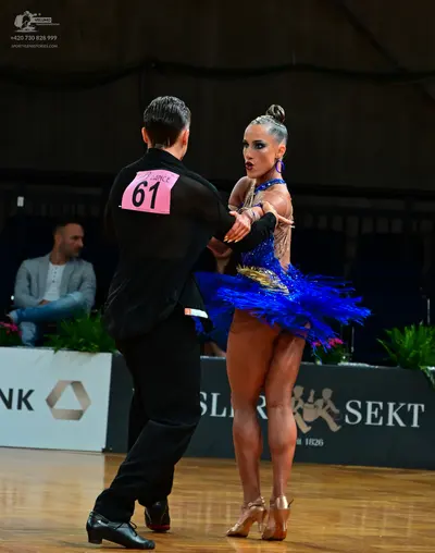 Dancesport competitor #61: Male dancer: black suit