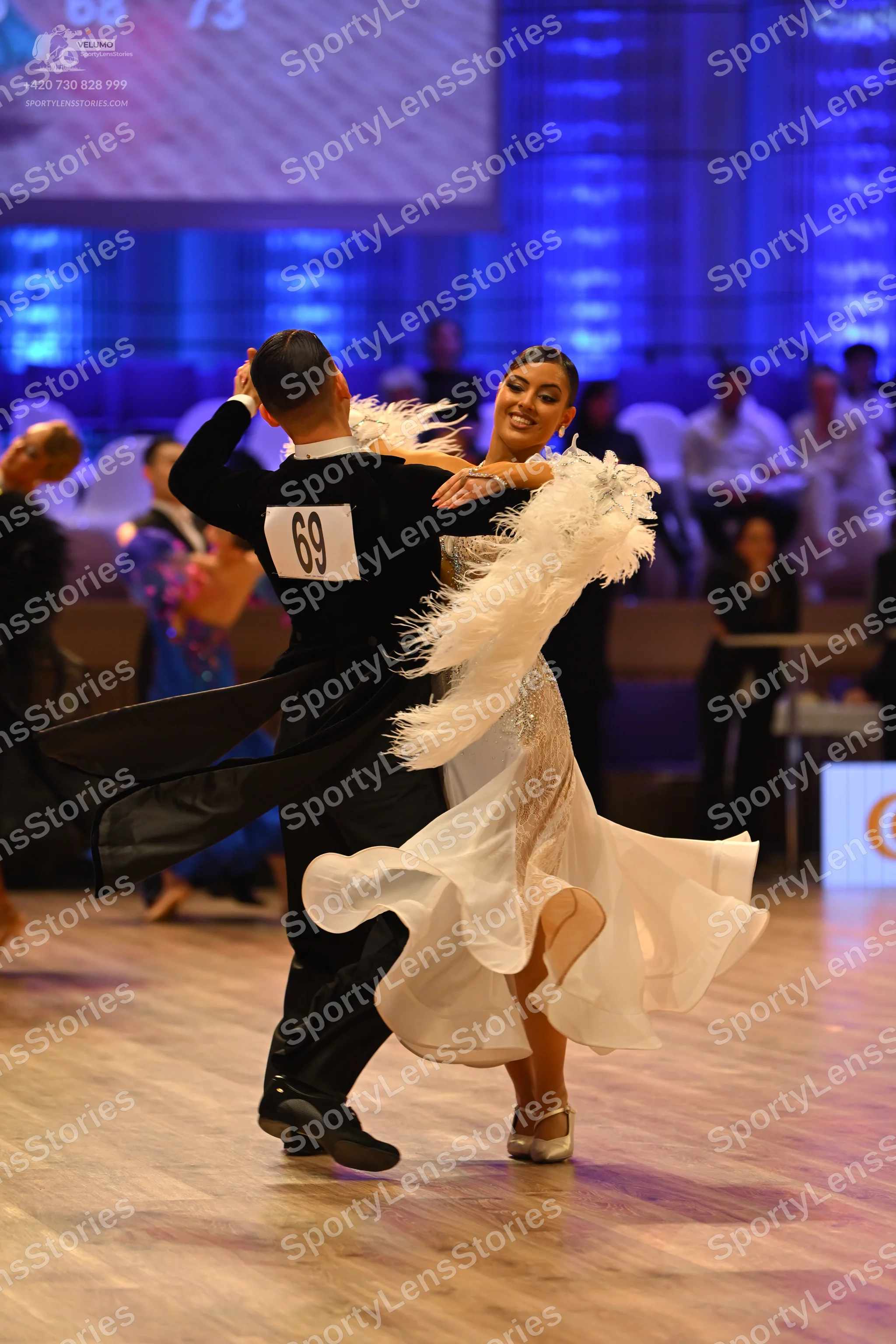 Dancesport competitor: Male dancer: black long-sleeved shirt and black trousers